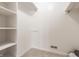 A sizable walk-in closet with ample shelving and room for organization, ideal for wardrobe storage at 2141 Rome Dr # Apt B, Indianapolis, IN 46228