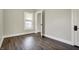 Empty bedroom with neutral paint and wood floors at 222 Raines St, Plainfield, IN 46168