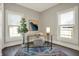 Cozy office space with natural light, a desk, chair, and an attractive area rug at 222 Raines St, Plainfield, IN 46168