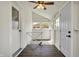 Sun room with wood-paneled walls, a ceiling fan, and windows for natural light at 222 Raines St, Plainfield, IN 46168