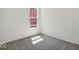 Cozy carpeted bedroom featuring neutral walls and a window to provide natural light at 2249 Aviary Ln, Danville, IN 46122