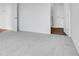 Bedroom featuring neutral carpet, white walls, and easy access to adjoining rooms at 2249 Aviary Ln, Danville, IN 46122