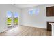 Breakfast nook featuring a sliding glass door with access to the backyard and white countertops at 2249 Aviary Ln, Danville, IN 46122