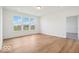 Living room with many windows and view of neighborhood at 2249 Aviary Ln, Danville, IN 46122