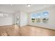 Bright, open living room with recessed lights, and a view of the fountain at 2249 Aviary Ln, Danville, IN 46122