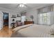 Comfortable bedroom featuring hardwood floors, decorative details, and large closet at 2253 Mullinix Rd, Greenwood, IN 46143