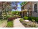 Inviting front porch with decorative columns and landscaping, offering a cozy welcome at 2253 Mullinix Rd, Greenwood, IN 46143
