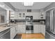 Stylish kitchen featuring stainless steel appliances, stone counters and ample cabinet space at 2253 Mullinix Rd, Greenwood, IN 46143
