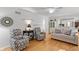 Comfortable living room with hardwood floors, neutral tones, and ample natural light at 2253 Mullinix Rd, Greenwood, IN 46143