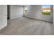 Bright bedroom with neutral carpeting, large windows, and fresh paint at 2338 Keystone Ct, Anderson, IN 46011