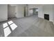 Spacious living room with neutral carpeting, a fireplace, and an open floor plan at 2338 Keystone Ct, Anderson, IN 46011