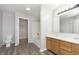 Bathroom features a double sink vanity, toilet, and shower-tub combination at 2348 Shadowbrook Dr, Plainfield, IN 46168