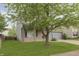 Charming two-story home with covered porch, gray siding, and a well-manicured lawn at 2348 Shadowbrook Dr, Plainfield, IN 46168
