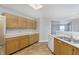 Kitchen features stainless steel appliances, light wood cabinets, and lots of counter space at 2348 Shadowbrook Dr, Plainfield, IN 46168