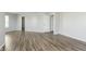 Living room features light gray walls and light wood floor at 2348 Shadowbrook Dr, Plainfield, IN 46168