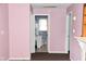 View of the bathroom showing the commode, sink, and shower through the doorway at 2726 S Roena St, Indianapolis, IN 46241