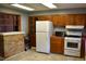 Functional kitchen featuring ample cabinet space and essential appliances at 2726 S Roena St, Indianapolis, IN 46241