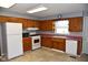 Bright kitchen with plenty of cabinets, updated appliances, and lots of natural light at 2726 S Roena St, Indianapolis, IN 46241