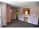Living room with a decorative fireplace and neutral-toned walls and floors at 2726 S Roena St, Indianapolis, IN 46241