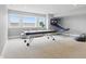 Recreation space features carpet, light gray walls, and natural light. Pool table and sports equipment at 284 Chatham Hills Blvd, Westfield, IN 46074
