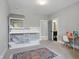 Bedroom featuring bunk beds, desk and carpet flooring, open to the bathroom at 284 Chatham Hills Blvd, Westfield, IN 46074