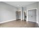 Empty bedroom featuring neutral colors, recessed lighting, and multiple closet and door access points at 284 Chatham Hills Blvd, Westfield, IN 46074