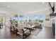 Bright living room with a large sectional couch, lots of windows, and a view of the outdoors at 284 Chatham Hills Blvd, Westfield, IN 46074