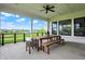 Covered patio with a view features a dining table, bench, and chairs at 284 Chatham Hills Blvd, Westfield, IN 46074