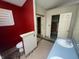 Another angle of the bathroom, featuring a toilet, double sinks and tiled floors at 2904 Inverrary Ct, Indianapolis, IN 46234