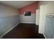 Bedroom featuring hard wood floors, two-tone accent walls, and large closet at 2904 Inverrary Ct, Indianapolis, IN 46234