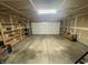 Spacious two-car garage with ample storage space and overhead lighting for added convenience at 2904 Inverrary Ct, Indianapolis, IN 46234