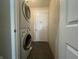 Convenient laundry area with stacked washer and dryer units and a bright, functional space at 2904 Inverrary Ct, Indianapolis, IN 46234