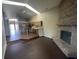 Brick fireplace in the living room with a view of the kitchen at 2904 Inverrary Ct, Indianapolis, IN 46234
