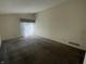 Spacious living room with large glass doors allowing ample natural light to illuminate the space at 2904 Inverrary Ct, Indianapolis, IN 46234