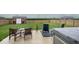 Expansive backyard featuring a patio set, hot tub and a storage shed, perfect for outdoor living at 3235 Myrtle Dr, Lapel, IN 46051