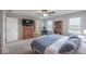 Comfortable bedroom with light-filled windows, closet space, and neutral carpet flooring at 3235 Myrtle Dr, Lapel, IN 46051