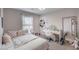 Charming bedroom featuring a work desk and an accent mirror creating a cozy and functional living space at 3235 Myrtle Dr, Lapel, IN 46051