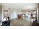 A look at the open layout of this home, including the kitchen, dining area, living room, and entry at 3235 Myrtle Dr, Lapel, IN 46051