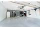 Spacious and well-organized garage, offering plenty of room for vehicles and storage solutions at 324 Palmyra Dr, Indianapolis, IN 46239