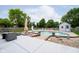 Backyard pool featuring a patio area, pool slide, and lounge chairs for outdoor relaxation at 324 Palmyra Dr, Indianapolis, IN 46239