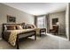 Comfortable bedroom featuring two twin beds, neutral walls, and a view of the city skyline at 333 Massachusetts Ave # 204, Indianapolis, IN 46204