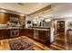 Beautiful kitchen features granite counters, stainless steel appliances, wood cabinets and hardwood floors at 333 Massachusetts Ave # 204, Indianapolis, IN 46204
