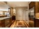 Well-lit kitchen with stainless steel appliances and granite countertops, seamlessly connecting to other living spaces at 333 Massachusetts Ave # 204, Indianapolis, IN 46204