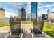 Inviting rooftop terrace equipped with comfortable lounge seating and panoramic views of the city at 333 Massachusetts Ave # 204, Indianapolis, IN 46204
