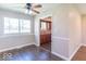 A dining room featuring hardwood floors and a view into the kitchen at 3362 E Sycamore Ln, Mooresville, IN 46158