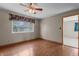 Bedroom with vinyl plank flooring and ceiling fan at 3561 Winings Ave, Indianapolis, IN 46221
