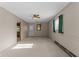 The large living room features neutral paint, and great natural light at 3561 Winings Ave, Indianapolis, IN 46221