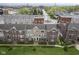 An aerial view of townhomes showcasing the architecture and neighborhood layout at 360 Neuman Way, Carmel, IN 46032