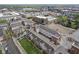An aerial view of townhomes showcasing the architecture, neighborhood, and cityscape at 360 Neuman Way, Carmel, IN 46032