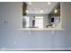 Kitchen featuring stainless steel appliances, stone countertops and backsplash, and modern lighting at 360 Neuman Way, Carmel, IN 46032